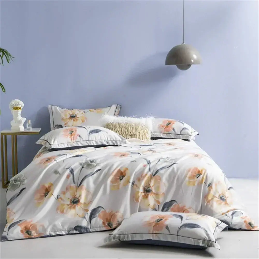 White duvet cover with soft peach and gray floral pattern featuring subtle sheen in DecorBites 600tc Egyptian cotton bedding set