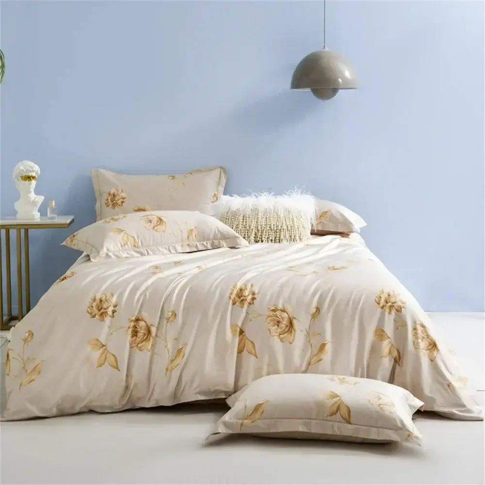 Cream-colored duvet cover with delicate gold floral embroidery in a decorbites 600tc egyptian cotton bedding set
