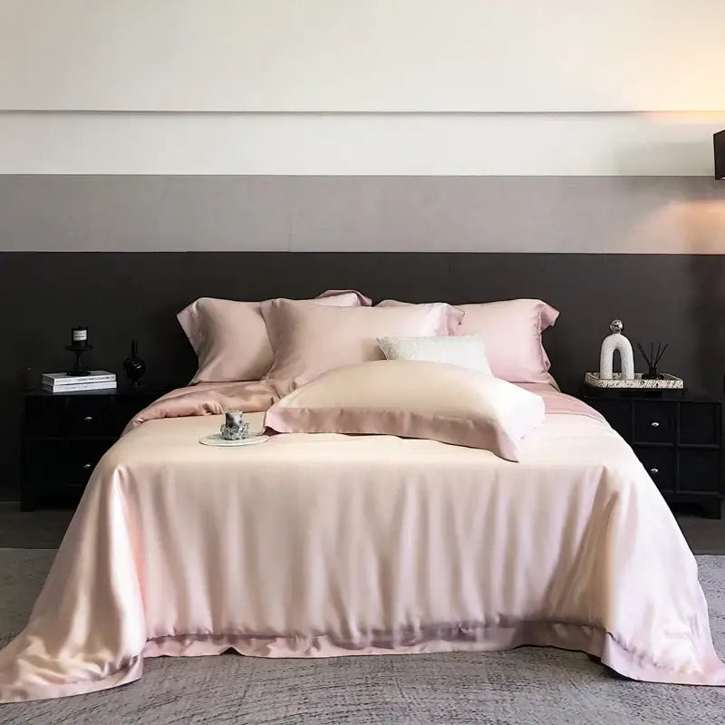 Luxurious blush pink satin duvet set with ruffled edges in lyocell eucalyptus fiber from decorbites bedding set