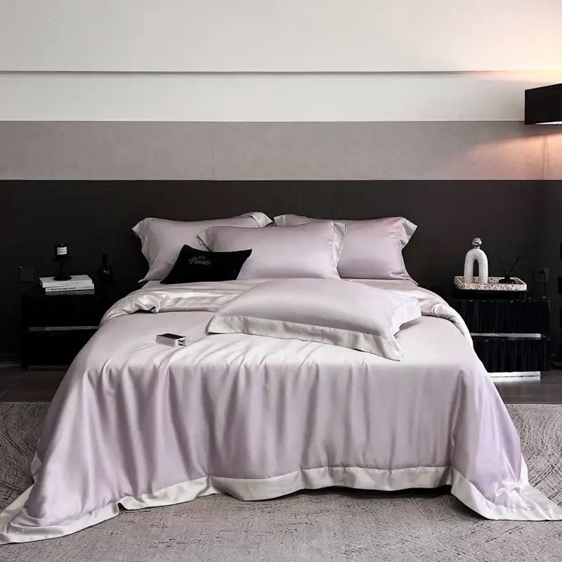 Lavender satin duvet bedding set with subtle sheen and white trim made from lyocell eucalyptus fiber by decorbites
