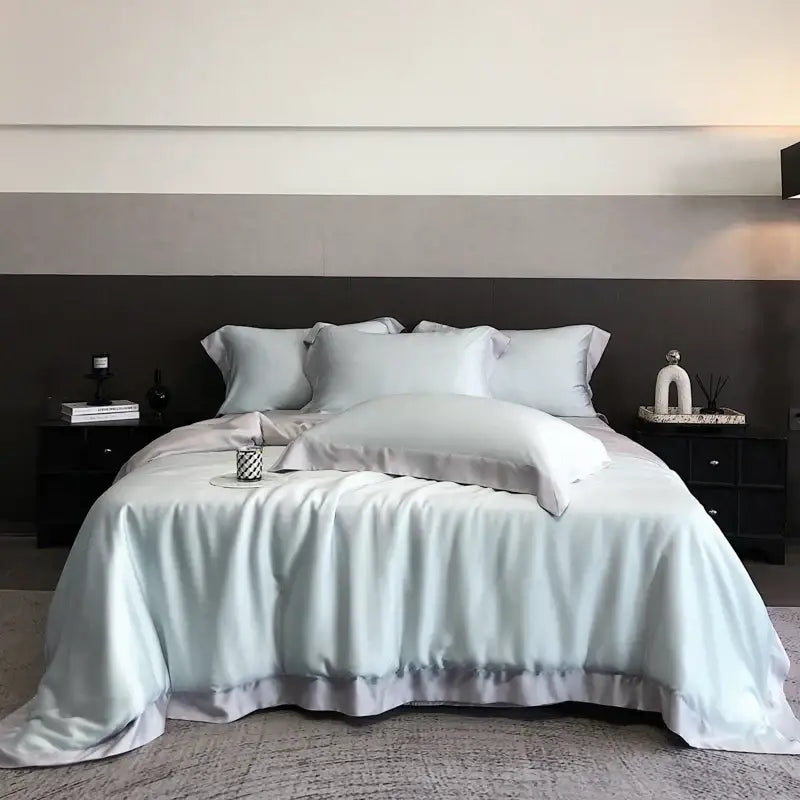 Light blue satin duvet cover set with ruffled hem made from lyocell eucalyptus fiber bedding set by DecorBites
