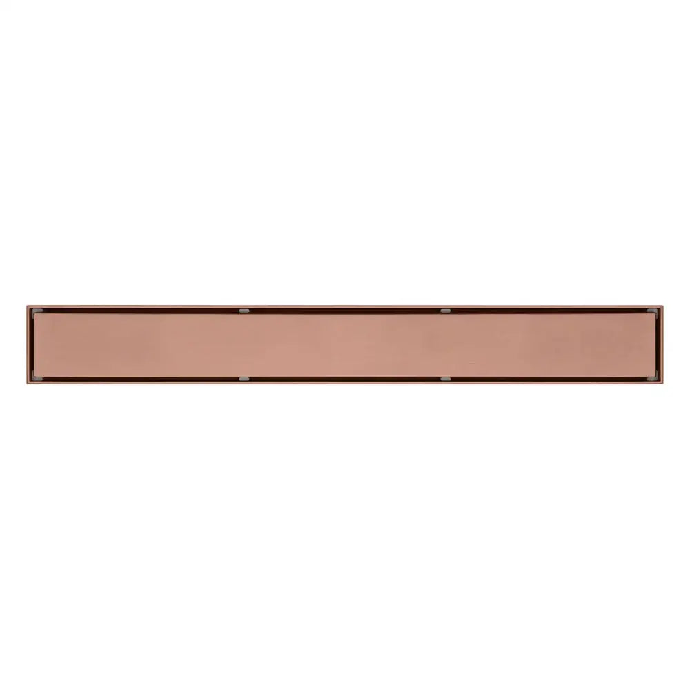 A sleek 60cm rose gold bathroom floor drain strainer in copper-colored metal with dark brown trim and smooth finish