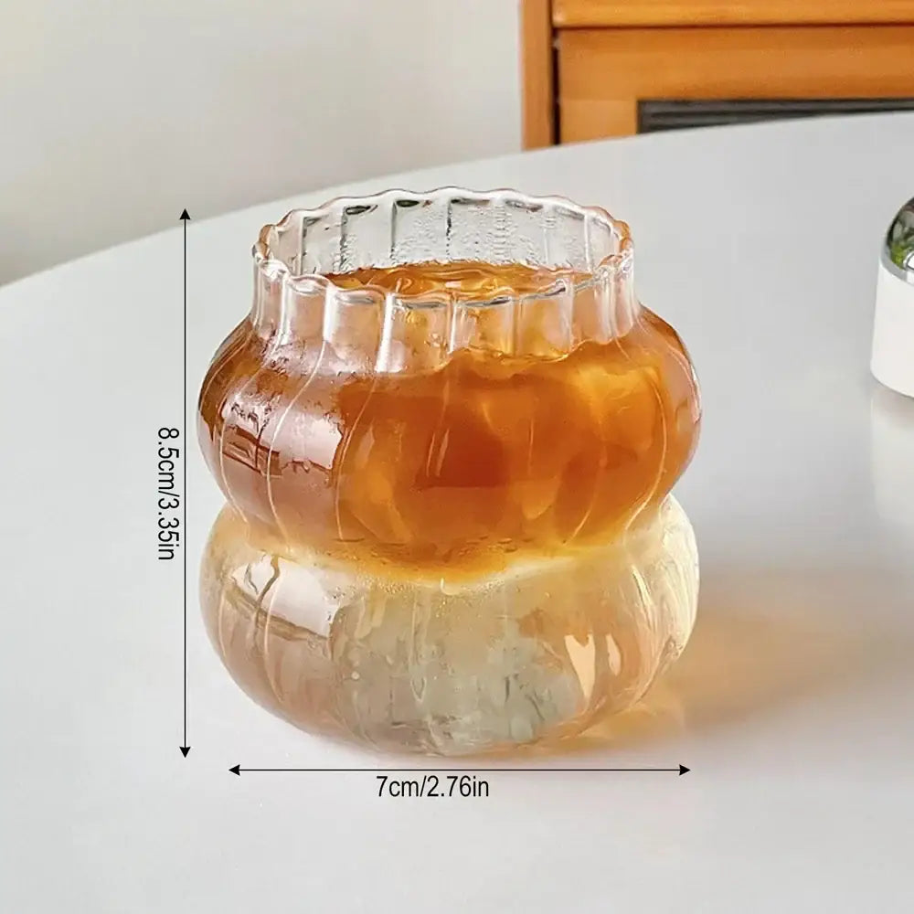 Clear glass pumpkin-shaped tea infuser with scalloped rim and textured surface for decorbites 650ml latte ribbed cocktail set