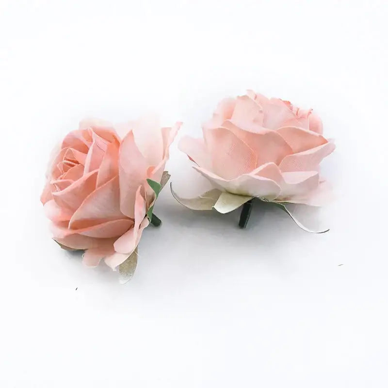 Two delicate peach-colored artificial flowers with layered petals and green stems in 6cm roses head for home decor