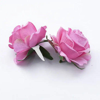 Two artificial pink 6cm roses head with fabric petals and green stems one with a white plastic clip for home decor