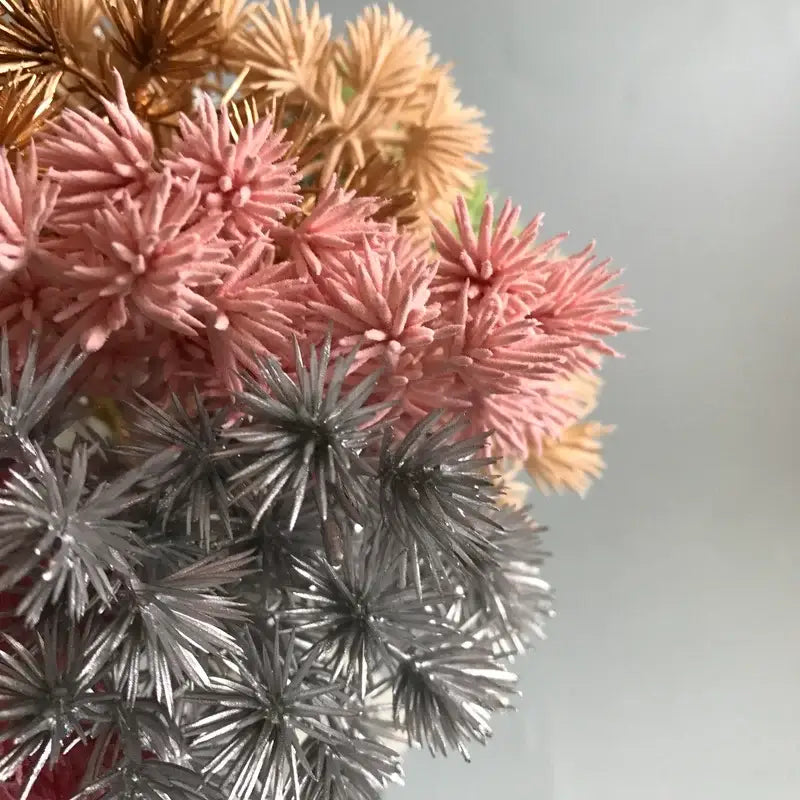 A cluster of decorbites 6pcs dried flower mix with pink silver and gold spiky petals for jewelry and candle crafts