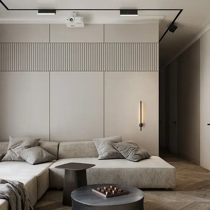 Modern beige sectional sofa with textured fabric and gray pillows next to decorbites™ 6w led wall lamp with push switch