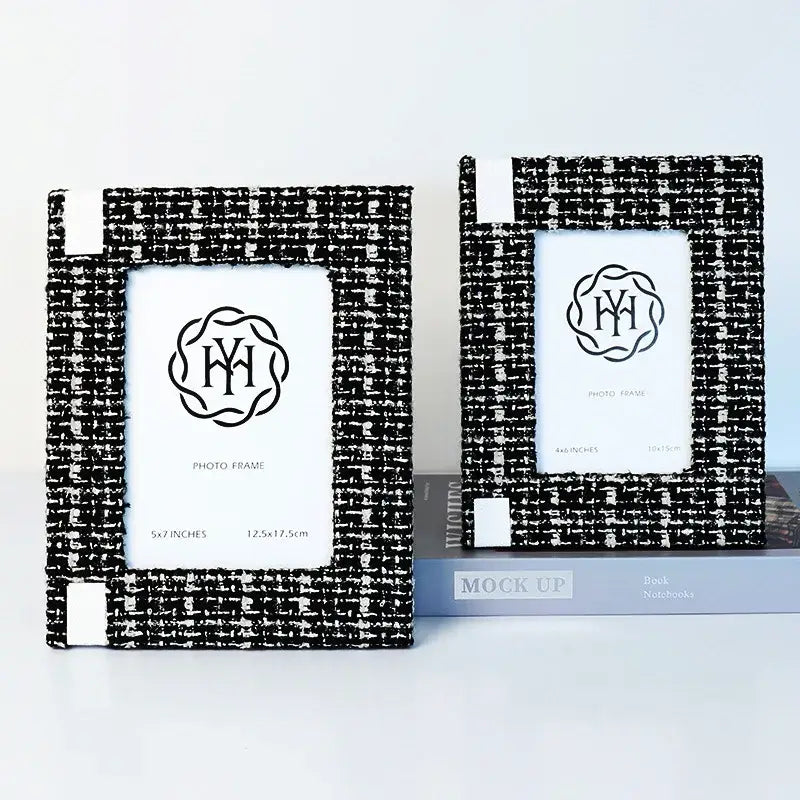 Black and white tweed-textured 6x7 inch fabric framed photo frame with subtle monogrammed emblem for TV cabinet decor