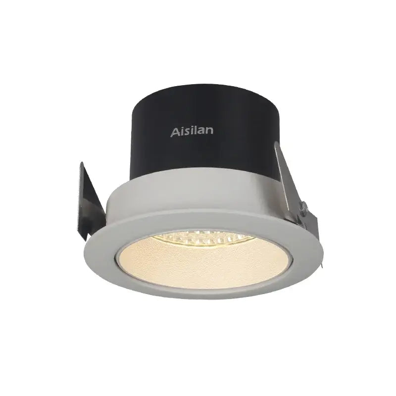 DecorBites 7.5cm recessed led downlight with black and white cylindrical design featuring warm led illumination