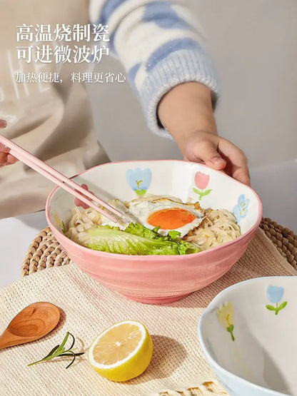 Pink ceramic ramen bowl with floral design and textured rim in decorbites™ 7 inch hand-painted noodle bowl
