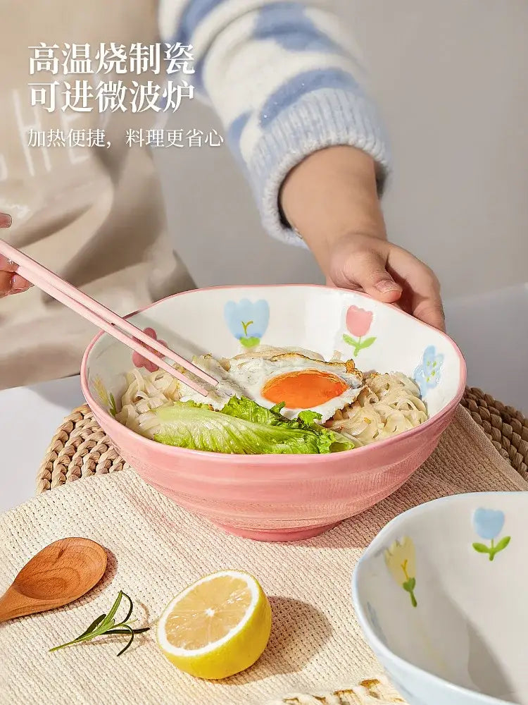 Pink ceramic ramen bowl with floral design and textured rim in decorbites™ 7 inch hand-painted noodle bowl