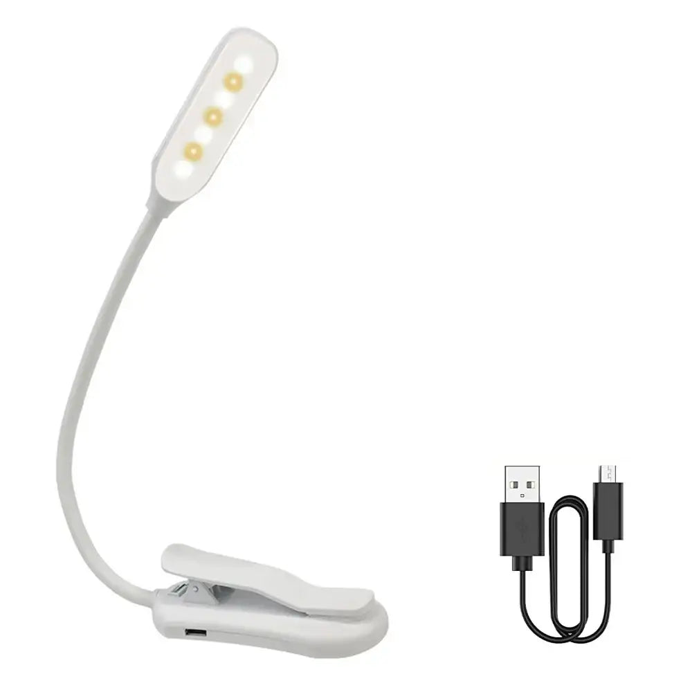 White flexible clip-on led book light with four warm bulbs and usb charging cable for reading by DecorBites