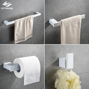 Decorbites 7-piece white bathroom hardware set with sleek rectangular towel bar toilet paper holder and shower hook