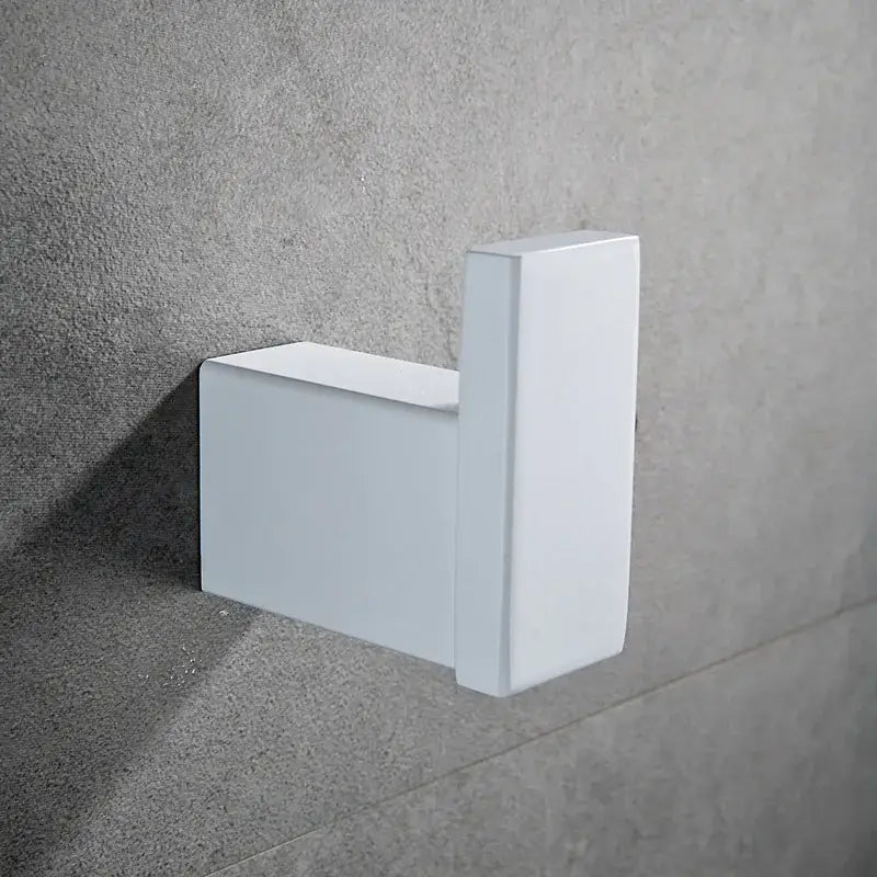 White rectangular wall hook with minimalist design from DecorBites bathroom hardware set for towels and toiletries