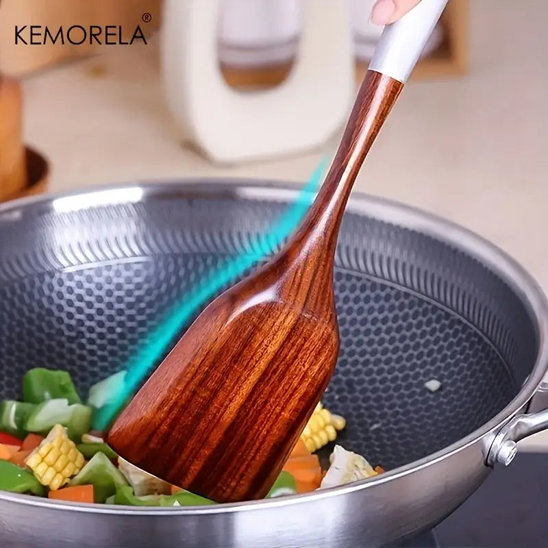 A sleek polished wooden cooking utensil with a white handle from the DecorBites thai wooden cooking utensil set