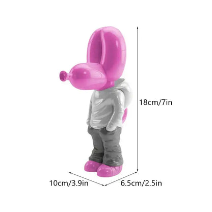 Glossy pink resin balloon dog statue wearing a silver hoodie and gray pants with matching pink shoes by decorbites