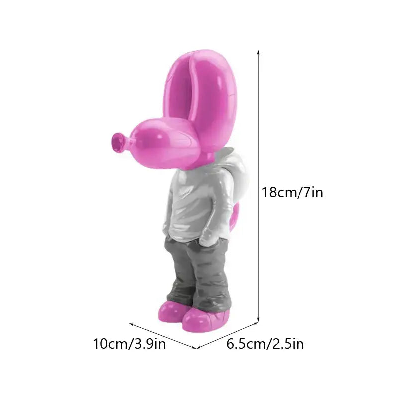 Glossy pink resin balloon dog statue wearing a silver hoodie and gray pants with matching pink shoes by decorbites