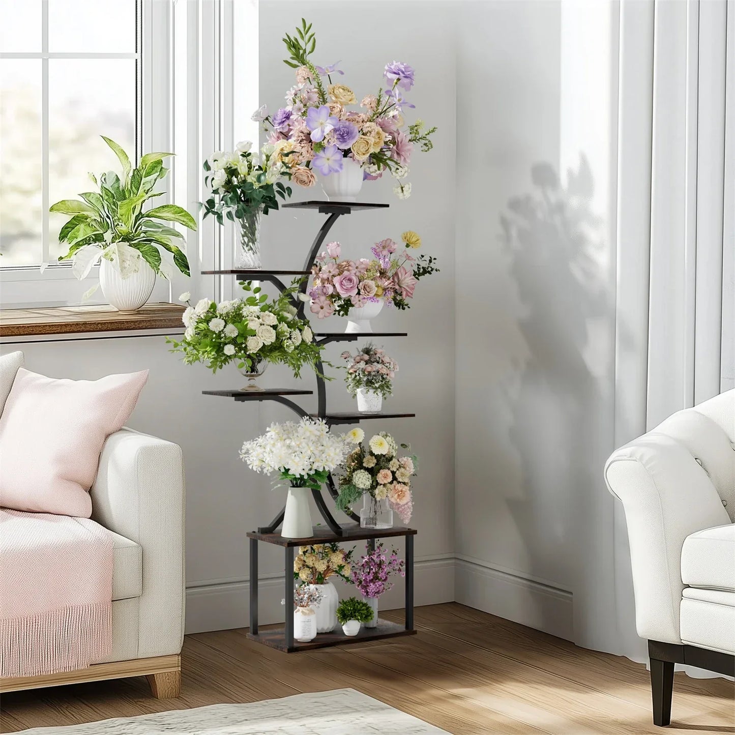 Decorbites™ black metal plant stand display rack with five curved shelves holding floral arrangements in clear vases