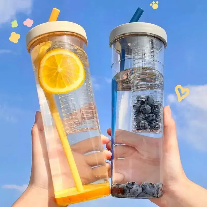 Two transparent decorbites 700ml filtered water bottles with straw lids containing lemon and blueberries ideal for outdoors