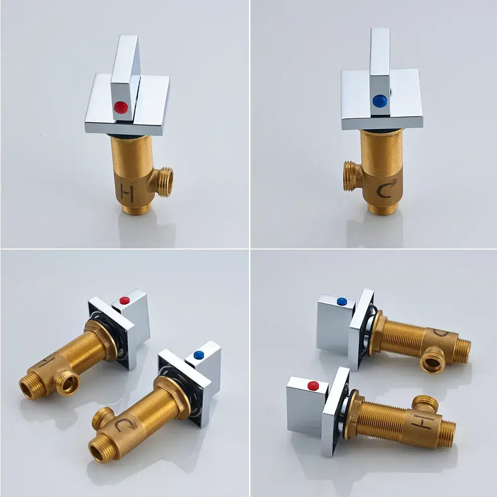 Modern chrome faucet handles with brass bodies and indicator dots for hot cold water on a black bronze wall mounted basin mixer tap