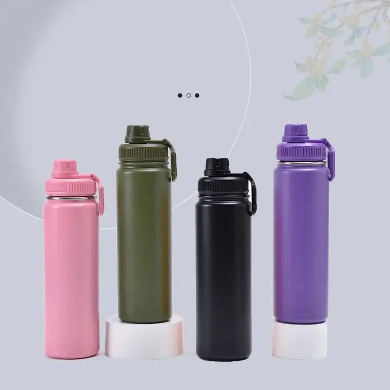 Four DecorBites insulated sports water bottles in pink olive green black and purple stainless steel 750ml vacuum thermos