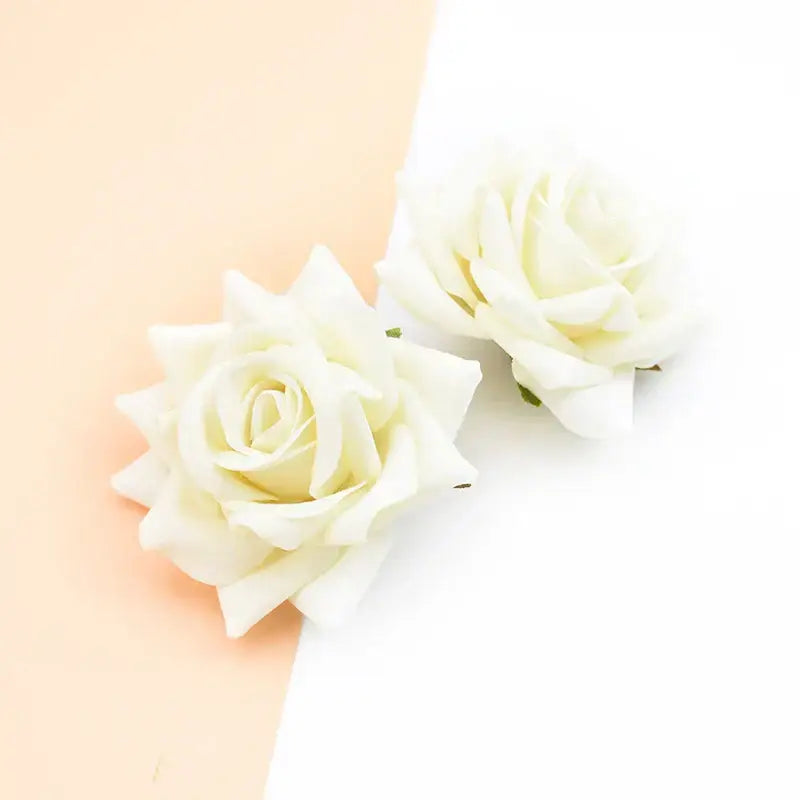 Two artificial white fabric rose heads with layered petals and green stems decorbites 7cm rose for wedding décor