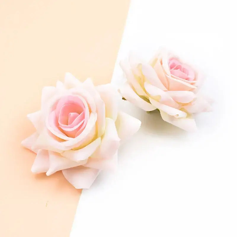 Delicate pink and cream artificial rose heads with layered petals made from soft synthetic material by decorbites 7cm rose
