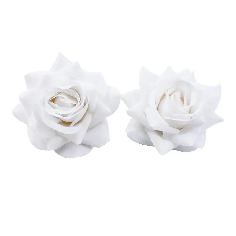 Two identical white foam rose heads with layered petals soft plush texture decorbites 7cm rose for wedding décor