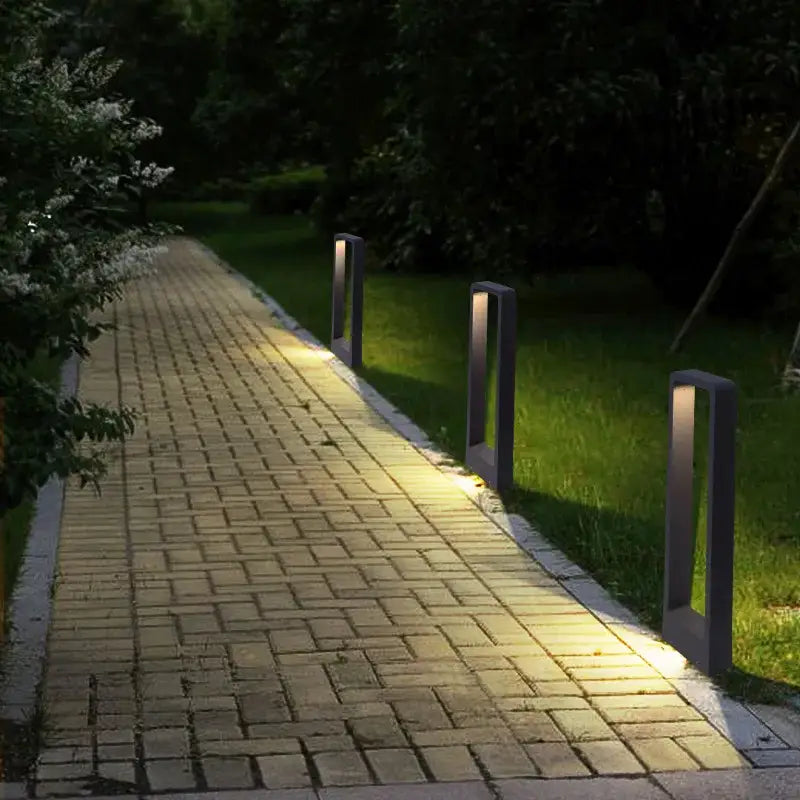 Modern black metal bollard light with warm yellow illumination decorbites 7w led aluminum garden for outdoor use
