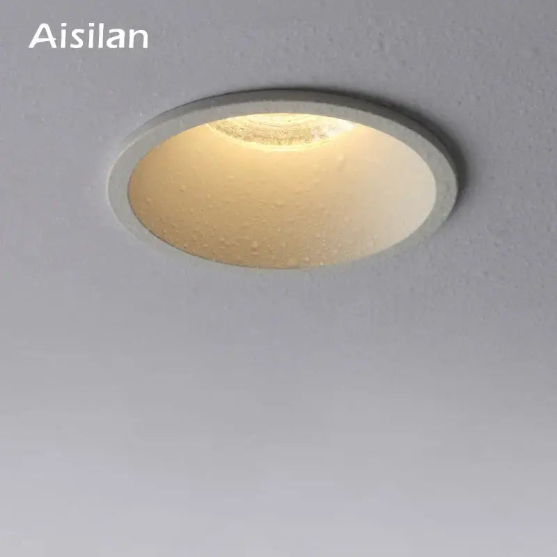 Aisilan decorbites’s 7w led downlight with sleek white circular design and warm diffused illumination with 30° beam angle