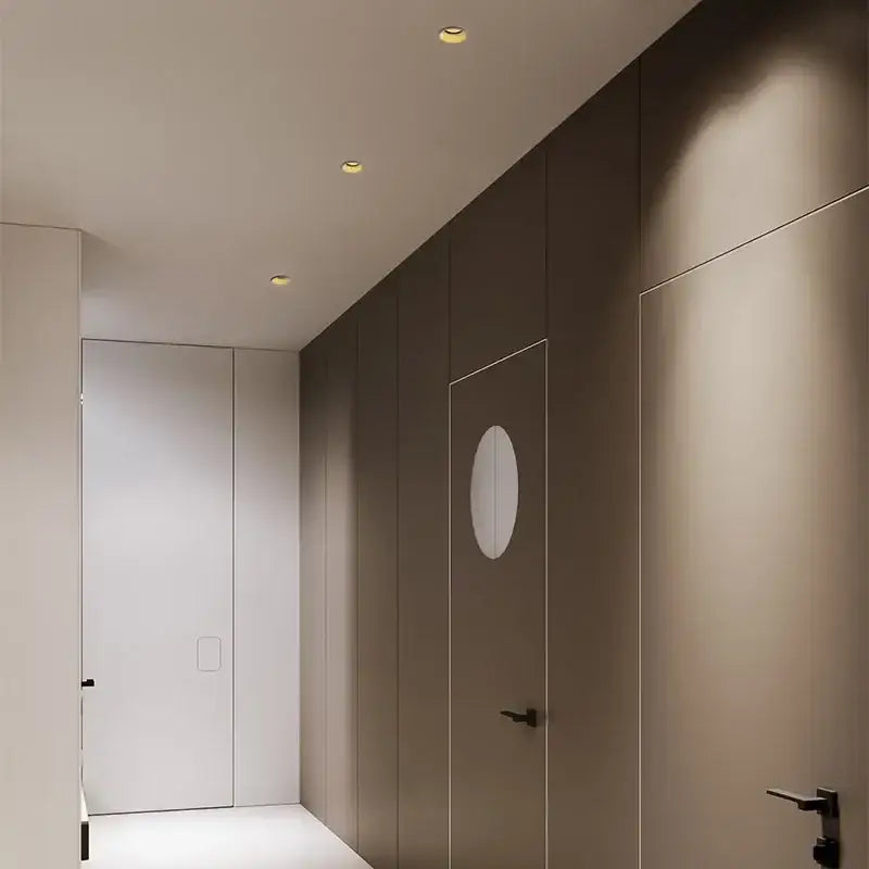 Minimalist hallway with warm taupe doors illuminated by decorbites 7w led recessed downlight with adjustable spot light