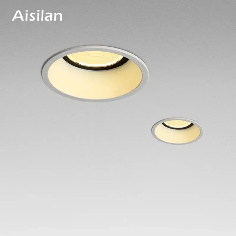 Aisilan decorbites 7w led recessed downlight with sleek silver metallic frame and warm yellowish dimmable glow
