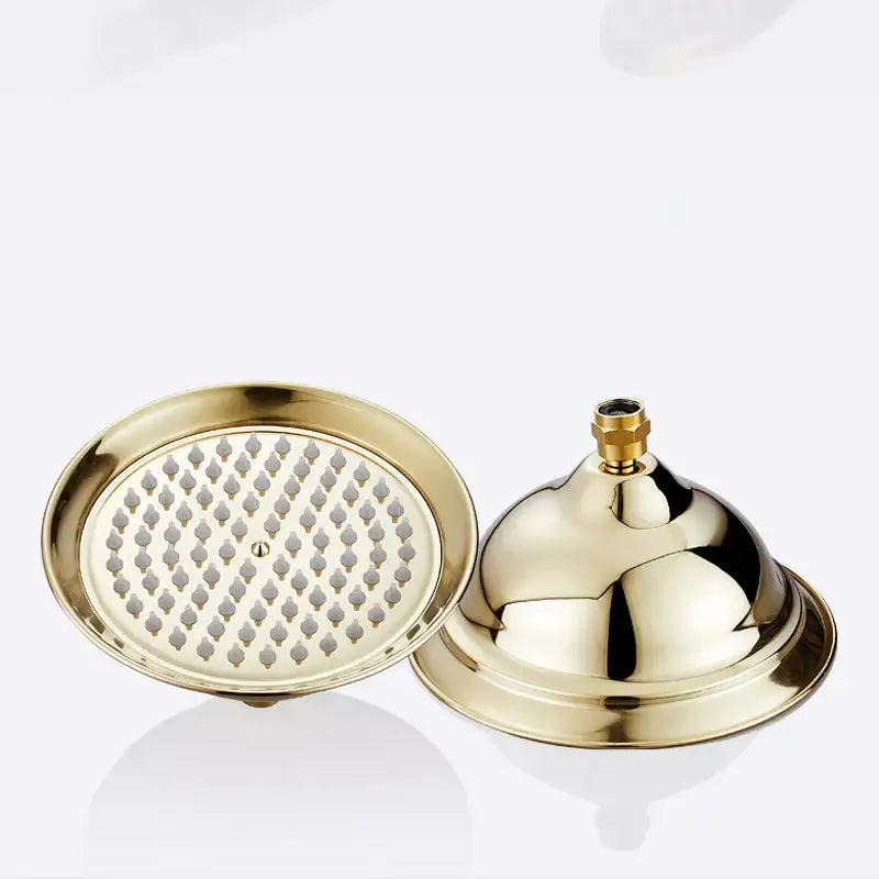 DecorBites™ 8 inch gold brass shower head with polished domed design and multiple spray holes for rainfall use
