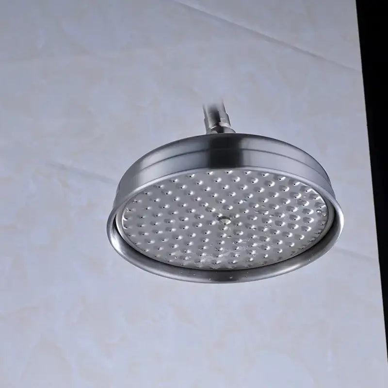 Decorbites™ 8 inch brass shower head with stainless steel round rainfall design and evenly spaced nozzles for bathroom use