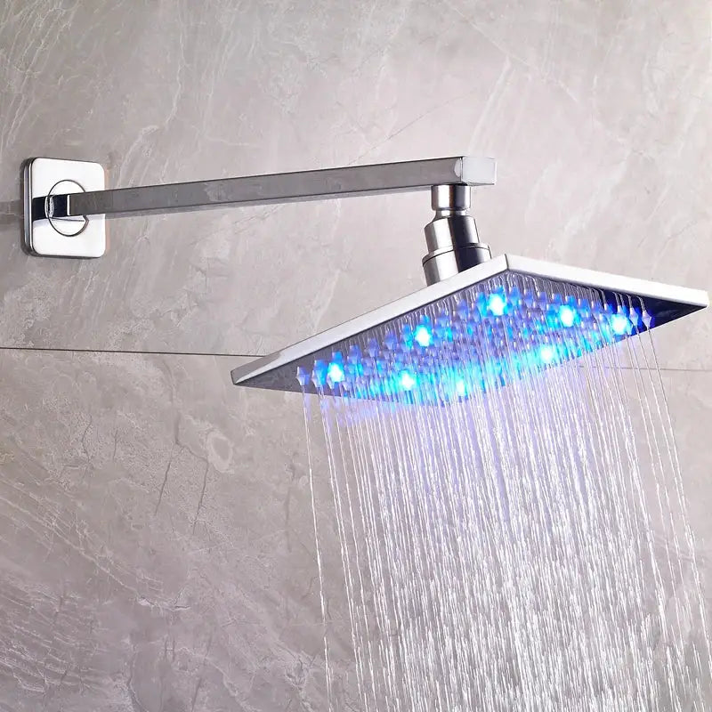 Decorbites™ 8 inch brass square led rainfall shower head with sleek chrome finish and blue led lights on adjustable arm