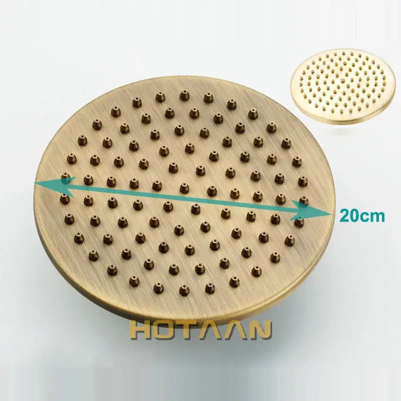 Decorbites 8 inch copper round overhead rain shower head in antique brass finish with brass-finished circular rain shower nozzles