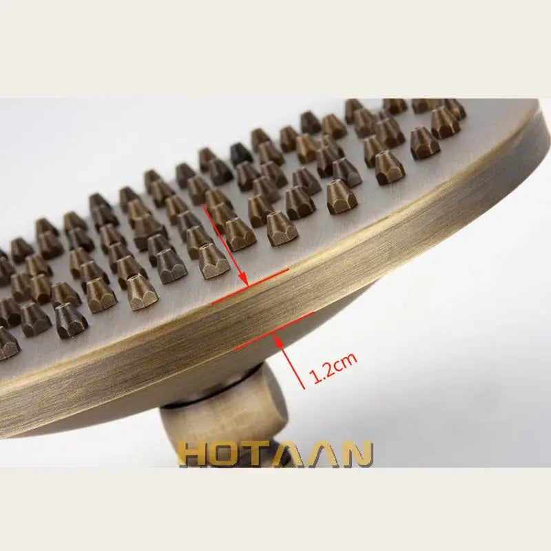 Decorbites 8 inch copper round overhead rain shower head in antique brass finish with textured cone nozzles