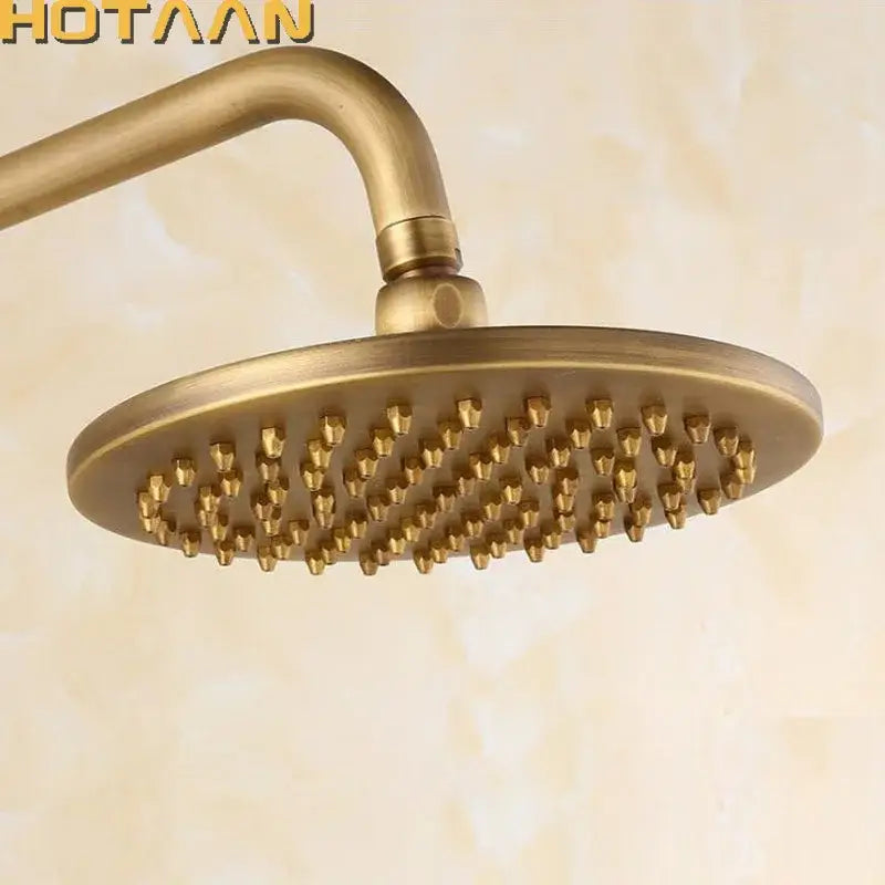 Decorbites 8 inch copper round overhead rain shower head in antique brass finish with multiple nozzles and matte finish