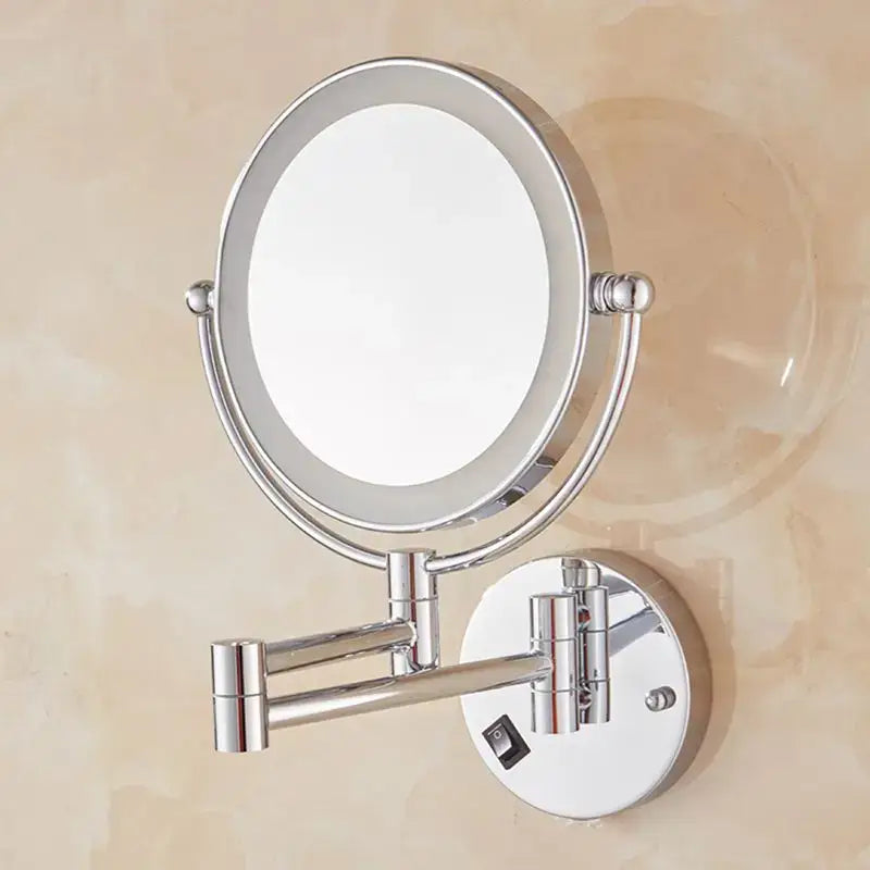 Chrome-finished wall-mounted makeup mirror with circular illuminated face and adjustable arm from DecorBites brass led folding series