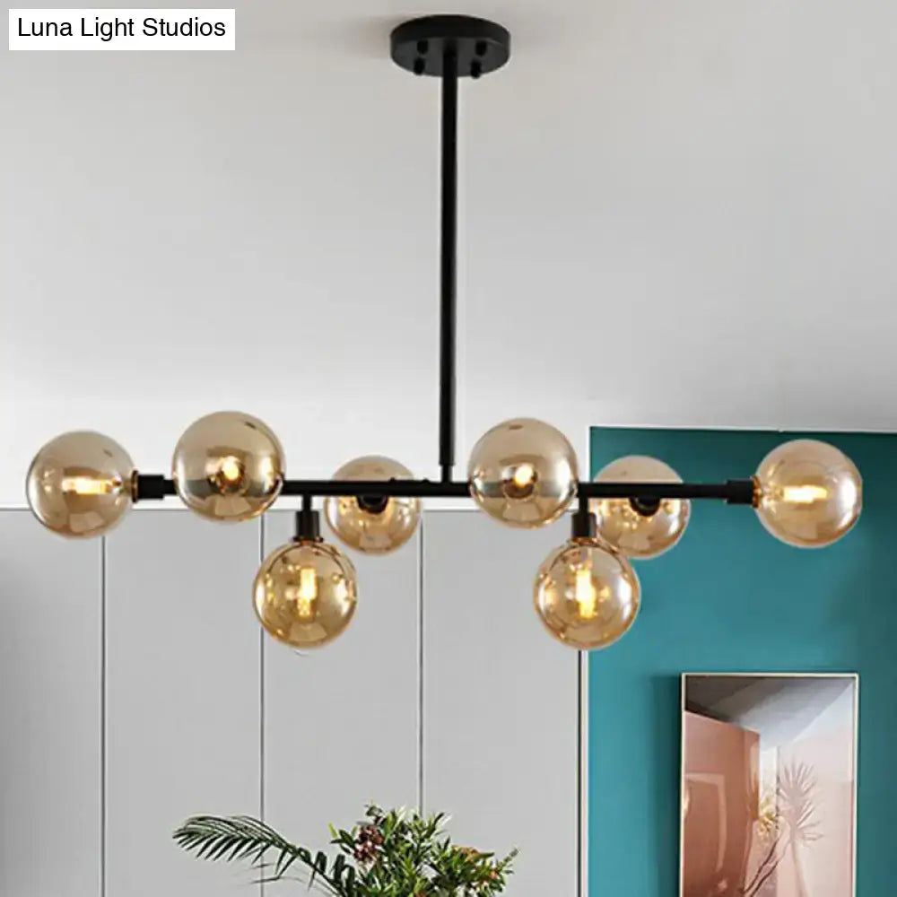 Modern black metal chandelier with eight amber glass globe bulbs featuring e26 e27 sockets ideal for restaurants