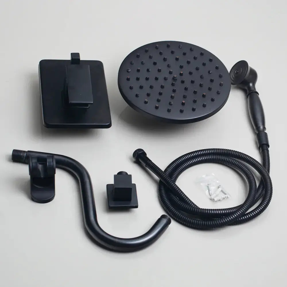 Black matte shower faucet set with 8 inch round rainhead handheld sprayer and flexible hose by DecorBites