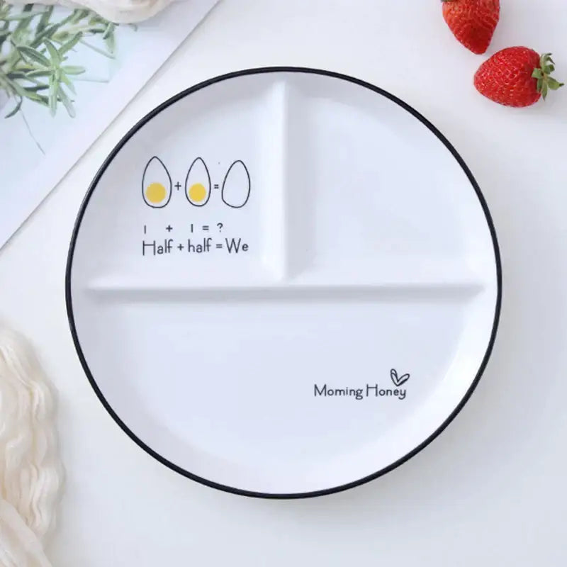 White ceramic DecorBites™ 8 inch round grid plate with black rim and playful egg math design for breakfast or solo dining