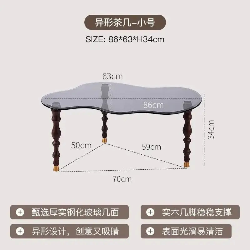 DecorBites™ solid wood peanut-shaped coffee table with transparent glass top and dark ornate legs for living room