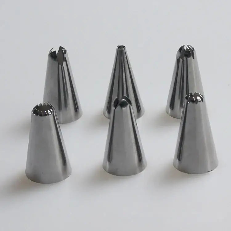 Set of six stainless steel piping tips included in the DecorBites 8pc silicone piping bag and 6pc nozzle set for cake decorating