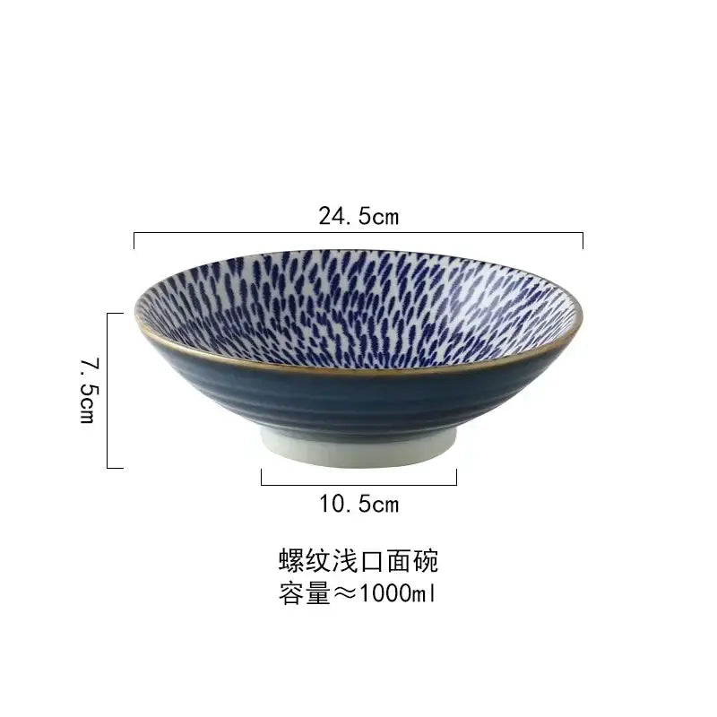 A ceramic japanese ramen bowl with deep blue exterior and dark blue speckled interior for soup salad rice use