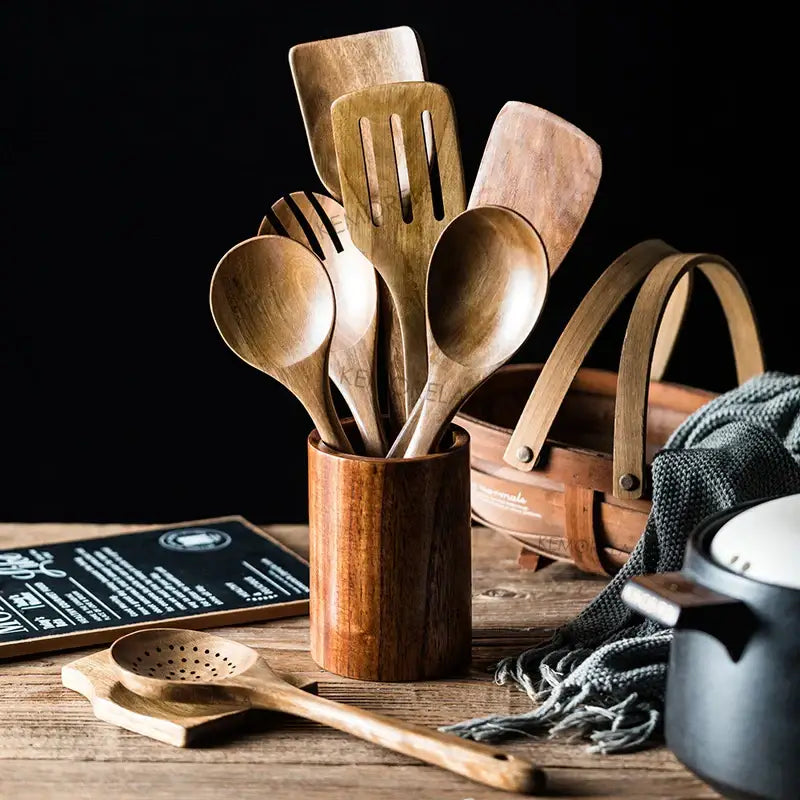 Decorbites™ 9-piece teak wooden cooking utensils set with rustic holder featuring natural wood grain and warm brown tones