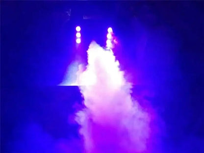 Decorbites™ 900w fog machine emitting vibrant purple and blue smoke under stage lights for weddings and parties
