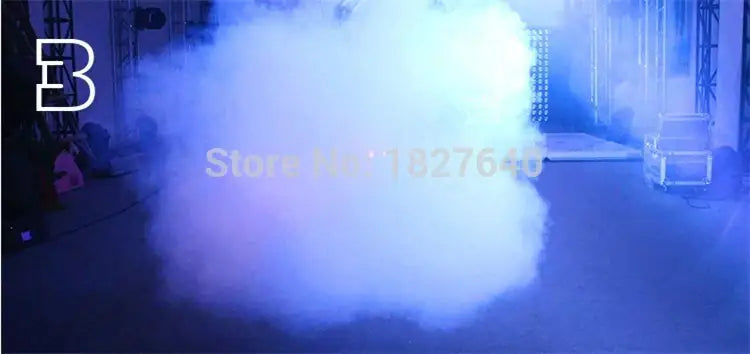Decorbites™ 900w rgb wireless fog machine emitting blue and white thick fog on a dimly lit stage setting