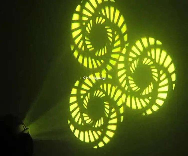 DecorBites 90w led spot moving head light projecting a glowing green spiral pattern for vibrant dj effects