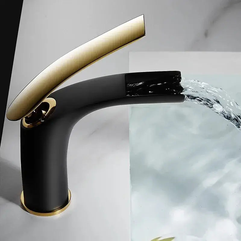 Black and gold modern waterfall faucet with sleek curved spout featured in decorbites stainless steel gold dustbin design